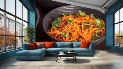 Asian korean carrot salad with spices in the ?lay plate Wall mural