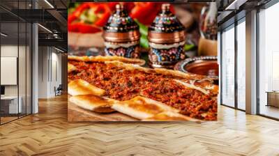 Traditional Turkish cuisine. Turkish pizza Pita with meat. Turk Pidesi or  Sucuk Pide. Beautiful serving dishes in the restaurant. Background image. copy space Wall mural