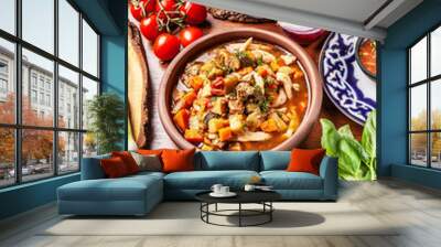 Traditional Uzbek oriental cuisine. Uzbek family table from different dishes for the New Year holiday. The background image is a top view. Wall mural