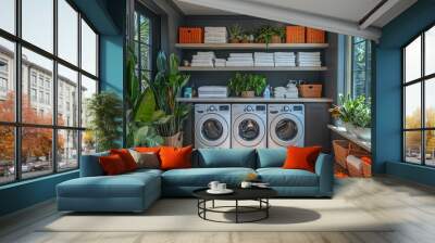 Modern laundry room with three washing machines, wooden floors, and plants. Wall mural