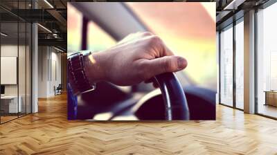 driver hands holding steering wheel Wall mural