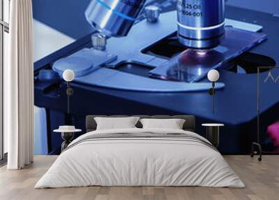 Close up of microscope in a laboratory (Research, medicine, surgery, health concept) Wall mural