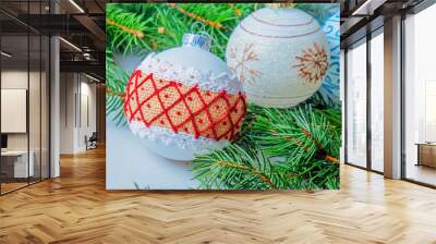 Merry Christmas and Happy New Year concept! Decorative balls on Christmas tree. Wall mural