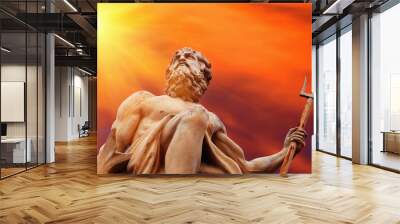 Mighty god of the sea and oceans Neptune (Poseidon) The ancient statue against background of dramatic view of sky. Horizontal image. Wall mural