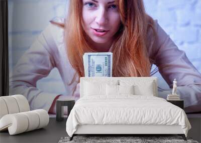 Portrait of young business woman with US Dollar bills. Wall mural