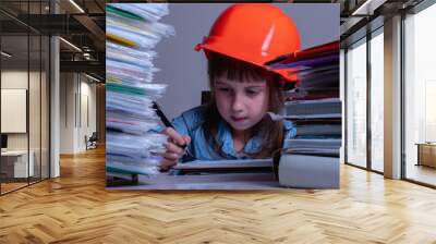 Young female engineer architect working in office. Wall mural