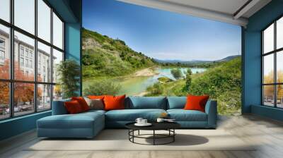 A wonderful landscape in the Carpathian mountains with a view of the lake between the rocks in sunny weather Wall mural