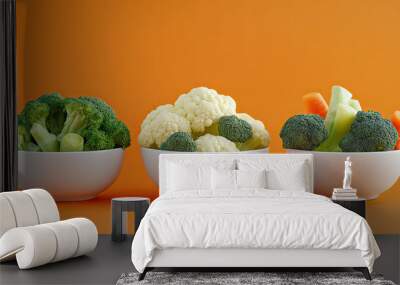 Bowl of broccoli, cauliflower and crinkle cut carrots, fresh steamed, fresh vegetables, mixed vegetables, orange background. Generative AI. Wall mural