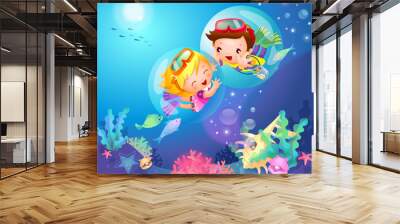 Side profile of a boy and a girl swimming underwater Wall mural