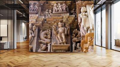 Bas-relief at famous ancient temple in Khajuraho, India Wall mural