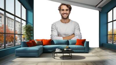 Portrait of handsome smiling young man with folded arms isolated on a white background.  Wall mural