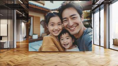 Family selfie at yard with smiling faces Wall mural