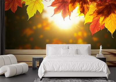 Wooden desk as pedestal for product display presentation with autumn landscape. Showcase of branches with yellow and orange falling leaves in the sunlight  Wall mural