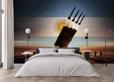 A powerful rocket launcher fires multiple missiles at sunset, with soldiers standing guard and Argentina flag in the background Wall mural