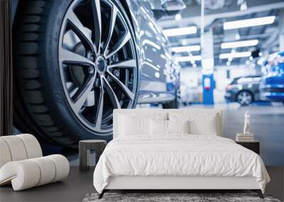 Close-up of a modern car wheel with an alloy wheel in a car service center Wall mural