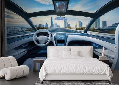 interior of a modern self-driving car with a picturesque city road of a metropolis outside the windows, without a driver at the wheel Wall mural