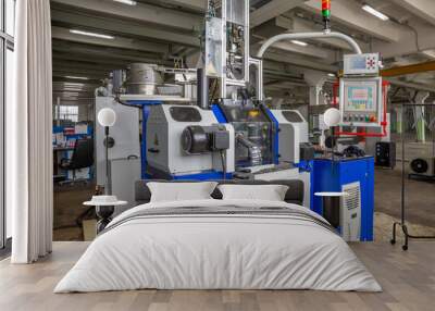 a number of CNC machines in the production room. Interior of industrial premises Wall mural