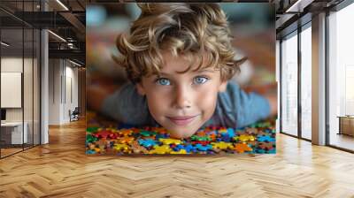 A boy on the background of a colorful puzzle . Autism Recognition Day. The Art of Studying Autism Wall mural