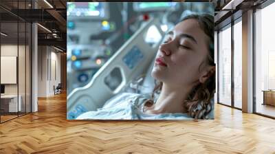 A girl in the intensive care unit at the hospital . A critically ill woman lying in the intensive care unit Wall mural