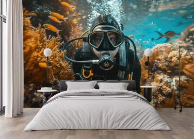 A male scuba diver swimming underwater near a coral reef. A diver in the underwater expanses Wall mural