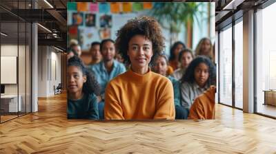 An African-American girl is sitting in an office at a lecture and listening to a teacher Wall mural