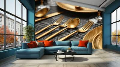 Table decoration with gold tableware . Gold cutlery on the table Wall mural