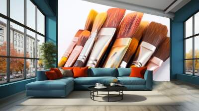 Composition of painting brushes on white background Wall mural