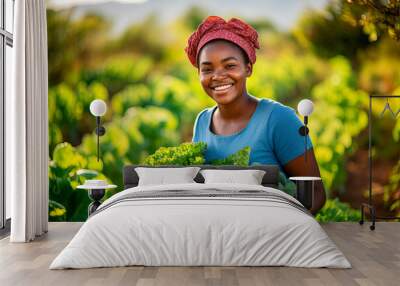 Portrait of a dedicated black woman holding a crate full of fresh cabbage in her hands on the farm outdoors. Wall mural