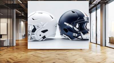 Two football helmets facing each other on white background Wall mural