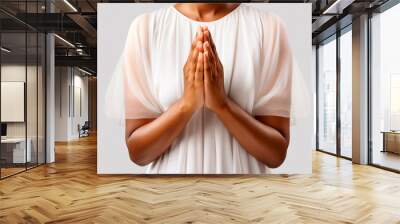 Two hands clasped in prayer, embodying devotion and faith on white transparent background Wall mural