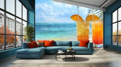 Tropical beach refreshment with two summer cocktails Wall mural