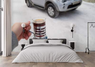 Winter morning with a car and a Cup of coffee Wall mural