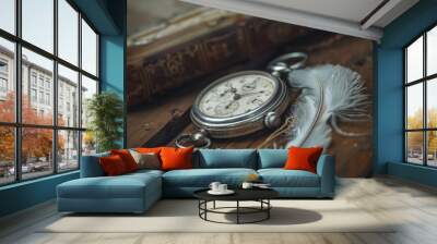 A vintage pocket watch and quill resting on an ancient wooden table with a weathered book Wall mural