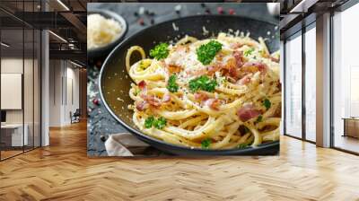 Delicious creamy spaghetti carbonara adorned with fresh parsley and crispy bacon Wall mural