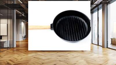 cast iron black pan with ribs on a white background, isolate Wall mural