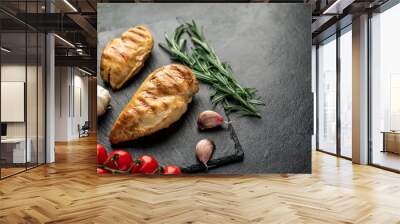 two grilled chicken breasts on a stone background Wall mural