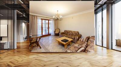 Luxury room in beige tones in a classic style with two brown-striped sofas and a coffee table Wall mural