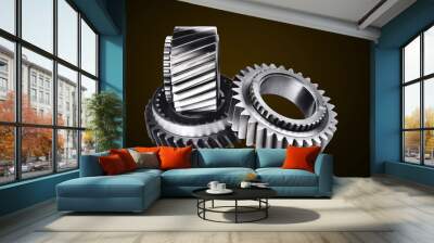 Gears. Cogwheels for a car gearbox. On a colored background Wall mural