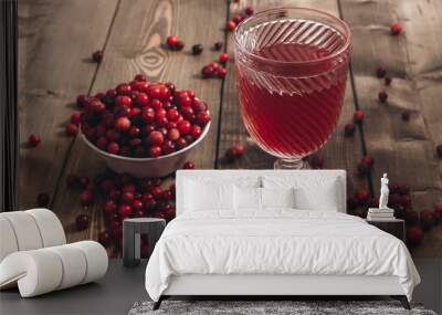 red vitamin drink. cranberry juice and fresh cranberries on the table Wall mural