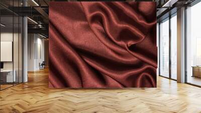 Smooth elegant brown silk or satin luxury cloth texture can be used as abstract background. Crumpled fabric Twisted at the side. Wall mural