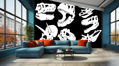 Graphical set of dinosaur skulls isolated on black, vector tattoo illustration Wall mural