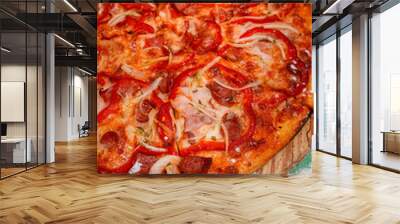 Delicious pizza with spicy sausages, fresh vegetables, and creamy cheese and thin crust  Wall mural