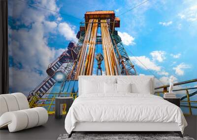 Oil and Gas Drilling Rig. Oil platform isolated on white background. Drilling rig in oil field for drilled into subsurface in order to produced crude, inside view. Petroleum Industry Wall mural