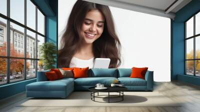 Young woman with long hair looking at her phone, isolated on a clear background Wall mural