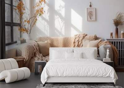 Cozy living room interior with knitted blanket on sofa Wall mural