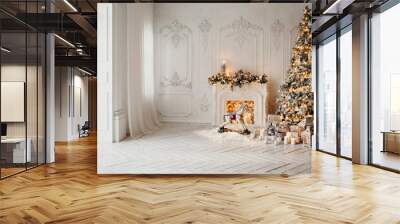 classical luxury interior of a white room with Christmas tree with garland, decorated fireplace, rocking horse, gifts for new year Wall mural