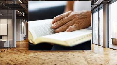 Closeup of senior woman's hands on bible, folded in prayer Wall mural