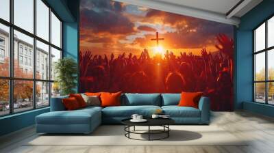 Festive crowd with raised hands praying to the cross at sunset, celebrating Christmas and Easter or worshiping in church concept . Wall mural