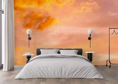 Sunset sky clouds trees orange. Colorful abstract background with fiery orange sky and clouds at sunset Wall mural