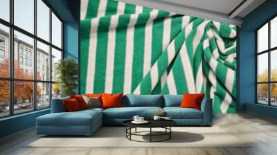 Green with white stripes textile as background. Green material texture on fabric Wall mural